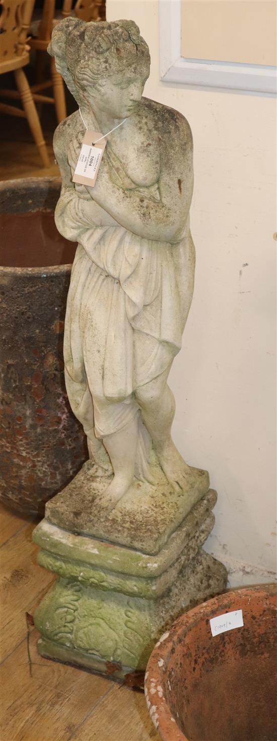 A reconstituted stone garden statue of a girl on pedestal base H.106cm